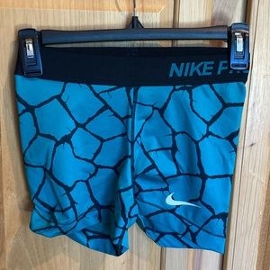 Turquoise Patterned Nike Pros